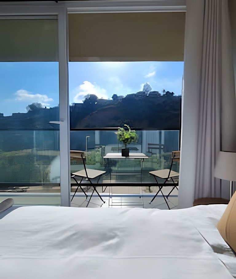 123,Estudio XL con Terraza y Vista