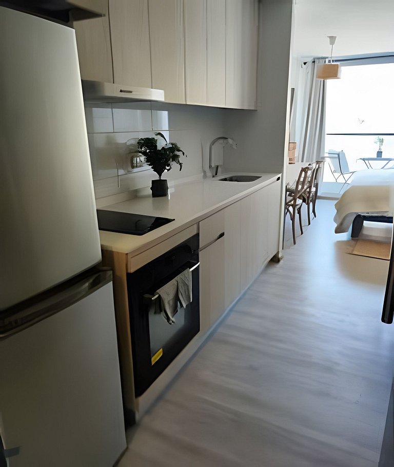 123,Estudio XL con Terraza y Vista