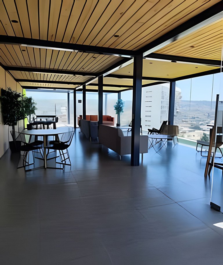 123,Estudio XL con Terraza y Vista